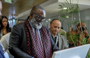 Innovation meets impact as Minister Buthelezi launches Batho Pele AI chatbot Minister Buthelezi interacts with the Batho Pele AI ChatboT